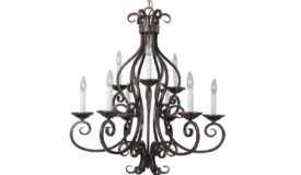 a decorative wrought iron chandelier in the color black, against a white background