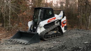 a bobcat t66 on a gravel road